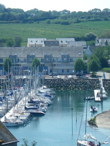 a group of boats docked in a marina at Studio de Charme "Le Coquillage " Jacuzzi privatif in Pléneuf-Val-André
