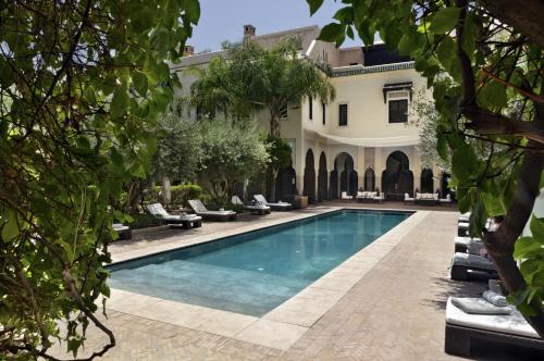 Piscina en o cerca de La Villa des Orangers - Relais & Châteaux