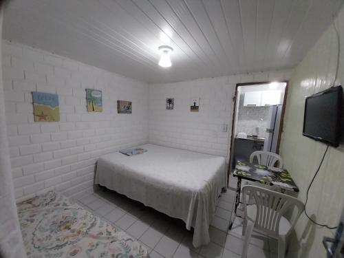 מיטה או מיטות בחדר ב-Village Pontes