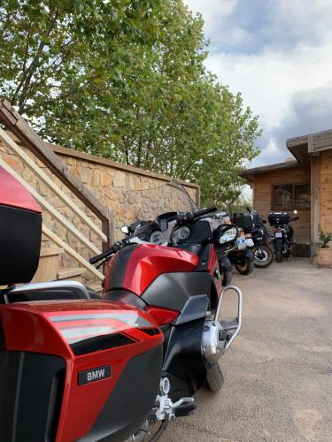 a row of motorcycles parked next to a building at Rise In Valley in Ifrane