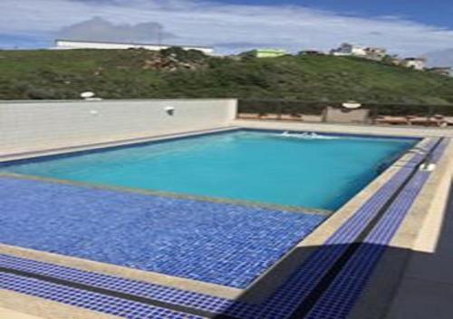 Swimmingpoolen hos eller tæt på Apartamento em Arraial do Cabo 501