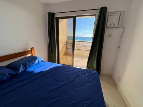 En eller flere senge i et værelse på Apartamento em Arraial do Cabo 501