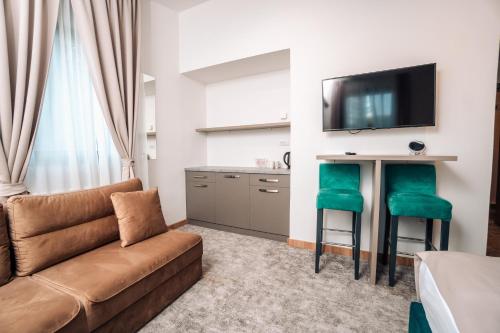 TV a/nebo společenská místnost v ubytování Hotel Forest