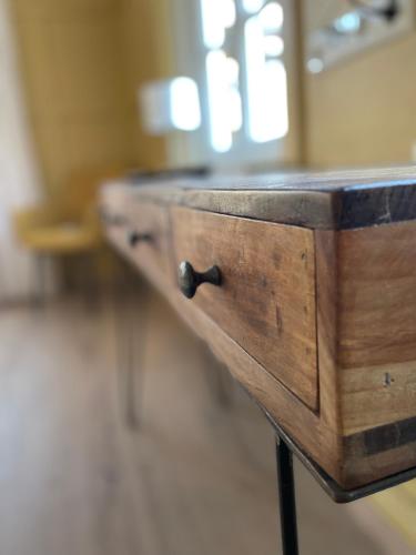a wooden dresser in a room with at Altes Rathaus in Schwaigern