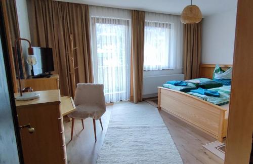 Posteľ alebo postele v izbe v ubytovaní Angi's Apartment