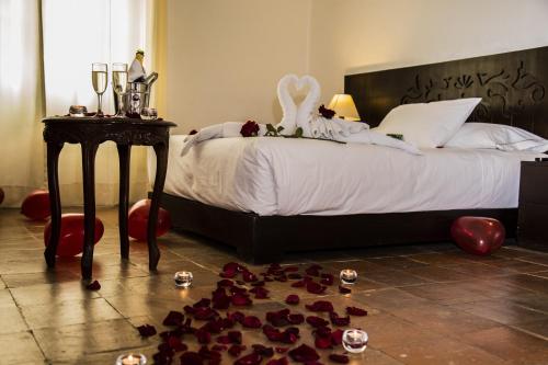 Postel nebo postele na pokoji v ubytování La Xalca Hotel - Asociado Casa Andina
