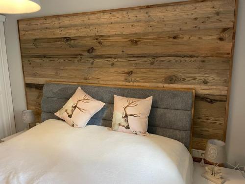 Postel nebo postele na pokoji v ubytování Wohlfühlappartment Gerlitzen