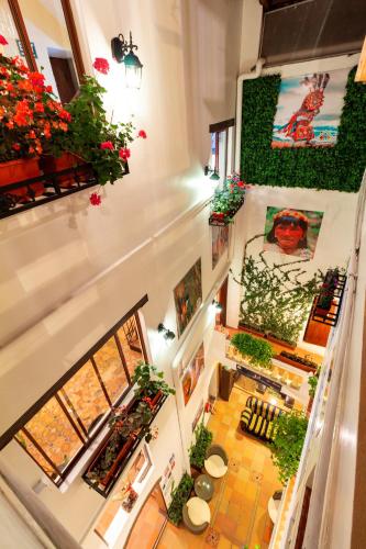 an overhead view of a room with plants and flowers at Friends Hotel & Rooftop - Historic Center & Museums in Quito