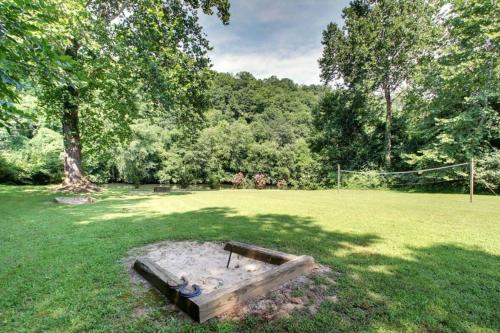 a log in a field with a goal at Astounding River View in Copperhill