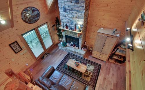 an overhead view of a living room with a fireplace at Astounding River View in Copperhill