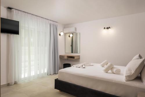 Postel nebo postele na pokoji v ubytování Quarters Luxury Apts