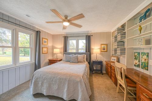 a bedroom with a bed and a ceiling fan at Yellow Fellow in Moneta