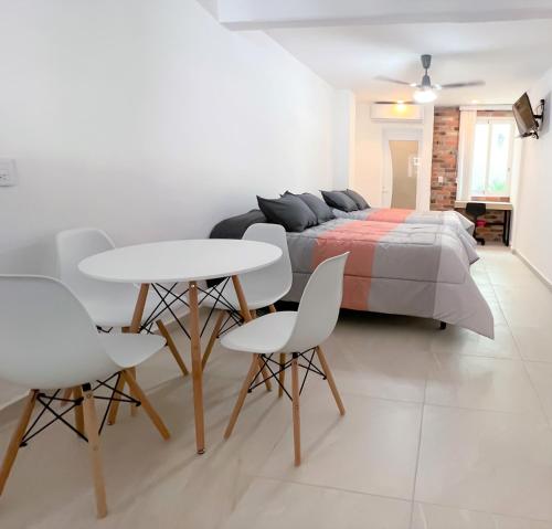 Letto o letti in una camera di Habitaciones Amubladas Logos II