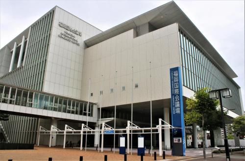 a large white building with a sign in front of it at Hotel New Gaea Kamigofuku in Fukuoka