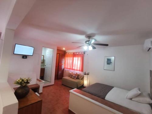 Postel nebo postele na pokoji v ubytování Bonito departamento con alberca en Cancún