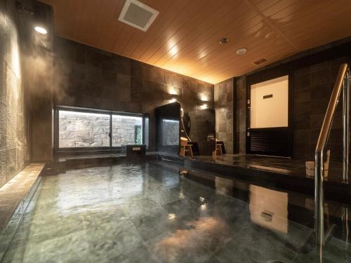 Kuchyň nebo kuchyňský kout v ubytování Super Hotel Kumamoto Ekimae Natural Hot Springs