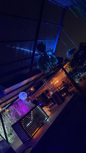 an overhead view of a table in a restaurant at night at Modern Loft inside a beautiful farm in General Viejo
