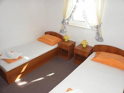 Posteľ alebo postele v izbe v ubytovaní Apartments Monika - 10m from sea