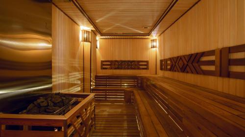 a bowling alley with a wooden floor and a wooden box at Wyndham Garden Baku in Baku
