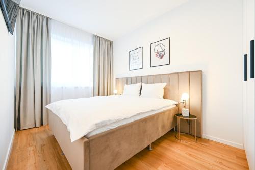 En eller flere senge i et værelse på KM Flats