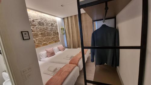 Ένα ή περισσότερα κρεβάτια σε δωμάτιο στο Hotel Norte