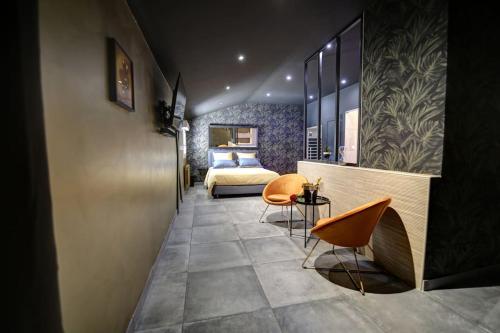 Posezení v ubytování Suite romantique avec ambiance cocooning