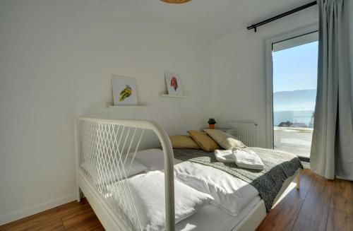 Posteľ alebo postele v izbe v ubytovaní Apart Invest Szklarska 800 A2