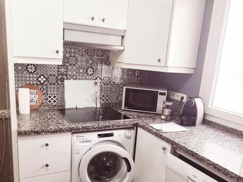 Kuchyň nebo kuchyňský kout v ubytování www apartamentovaldivia es Parking incluido
