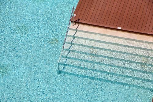 an overhead view of the shadows of a roof at Iberostar Waves Cala Millor - Adults Only in Cala Millor