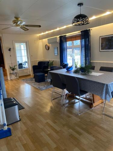 a living room with a table and chairs at The house of Mattis in beautiful Innvik in Innvik