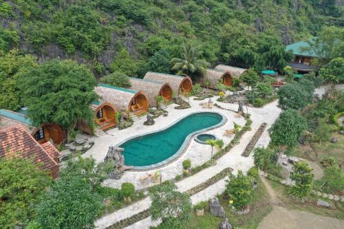an aerial view of a resort with a swimming pool at THE GOAT BOUTIQUE RESORT in Ninh Binh