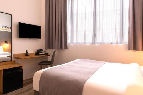 Μια τηλεόραση ή/και κέντρο ψυχαγωγίας στο Hotel Terre Neuve