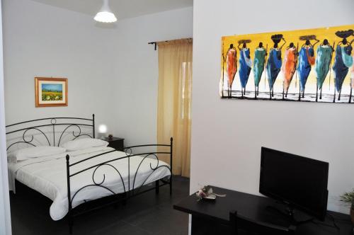Postel nebo postele na pokoji v ubytování B&B Largo Barile