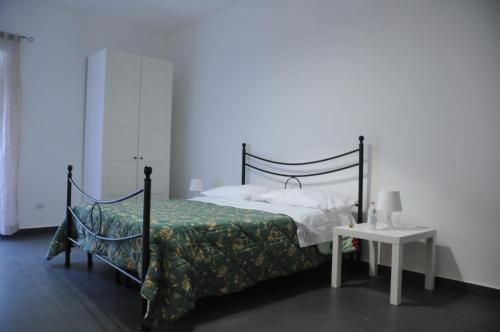 Кровать или кровати в номере B&B Largo Barile