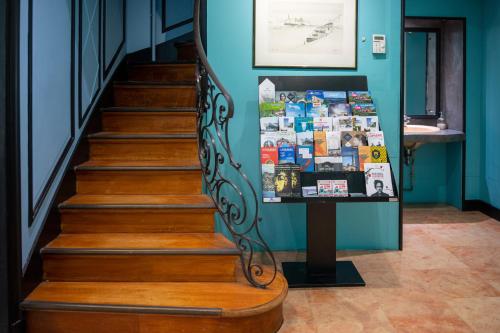 a set of stairs with a sign in front of it at Hotel de Normandie in Lyon