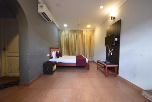 Katil atau katil-katil dalam bilik di HOTEL KING PARK