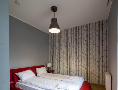 Postel nebo postele na pokoji v ubytování Vigo Hotel