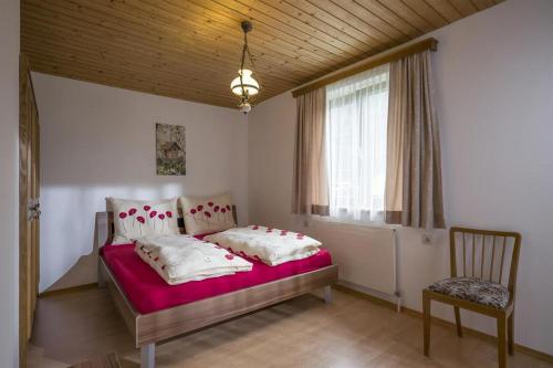 Ein Bett oder Betten in einem Zimmer der Unterkunft Ferienhaus Lanzinger