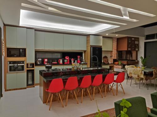 Kuchyň nebo kuchyňský kout v ubytování Casa Aracuã