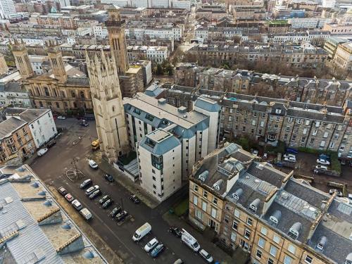 an aerial view of a city with buildings and cars at The Penthouse Suite - Luxury Like No Other in Glasgow