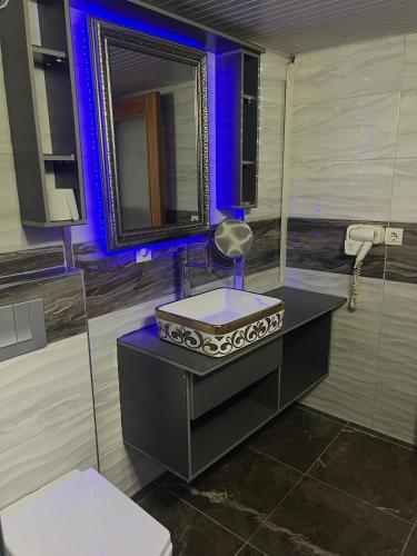Η κουζίνα ή μικρή κουζίνα στο Ünaten otel