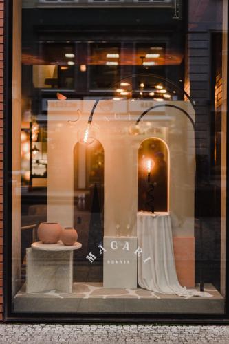 a window display of a dress in a store window at PURO Gdańsk Stare Miasto in Gdańsk