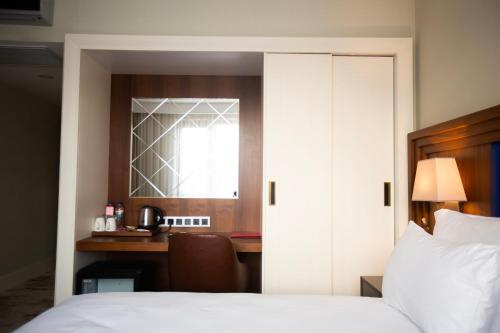 Postel nebo postele na pokoji v ubytování Ramada Plaza Sultanahmet By Wyndham