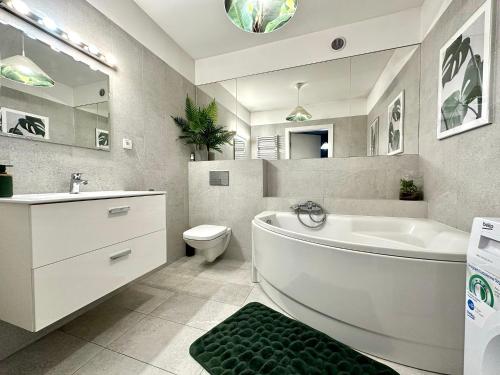 Kúpeľňa v ubytovaní LuxApart Kalisz Loft