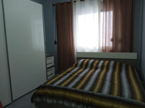 Un pat sau paturi într-o cameră la Apartment Durres