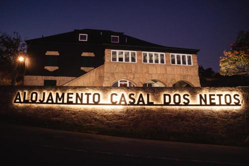 a sign that reads albuquerque casal dos nieves in front of a building at Casal dos Netos in Penhas da Saúde