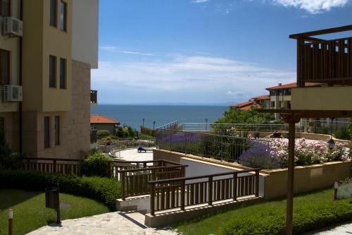 a view of the ocean from a building at Garden of Eden Complex in Sveti Vlas