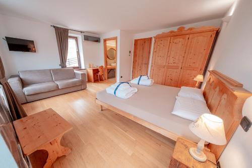 Ένα ή περισσότερα κρεβάτια σε δωμάτιο στο Agriturismo Mas dei Chini