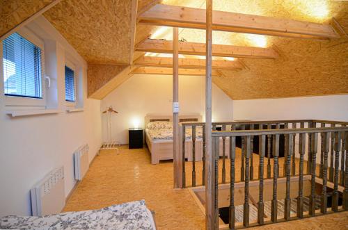 Postel nebo postele na pokoji v ubytování Apartmány Zaječák