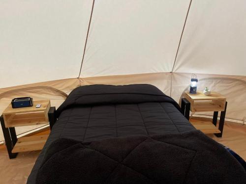 Un pat sau paturi într-o cameră la La Lunada